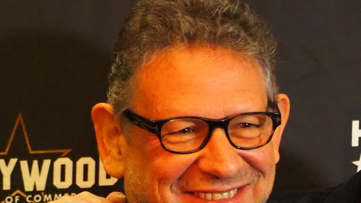 Universal Music Group chairman and CEO Sir Lucian Grainge speaking at an industry event